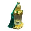 glass and metal with green tassle