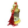 glass and metal with red tassle